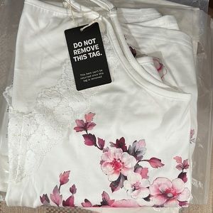 Floral tank in medium, brand new with tag.